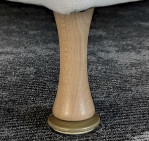 varnished wood bed leg
