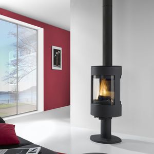 wood heating stove / central / cast iron / contemporary