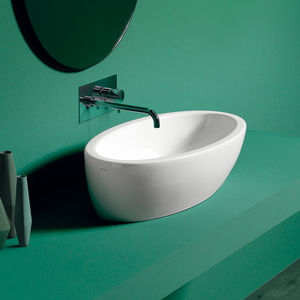 countertop washbasin / oval / ceramic / contemporary