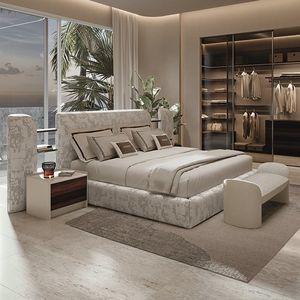 bed with upholstered headboard