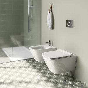 wall-hung toilet / ceramic / rimless