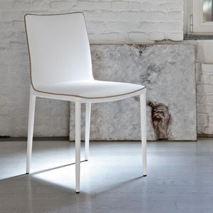 contemporary chair / upholstered / fabric / leather