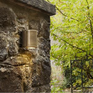 contemporary wall light / brass / halogen / round