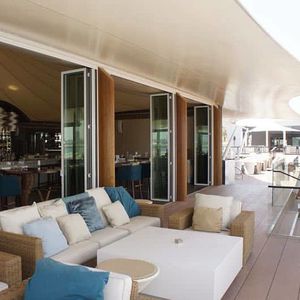 sliding patio door / folding / aluminum / double-glazed