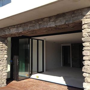 sliding patio door / folding / aluminum / double-glazed