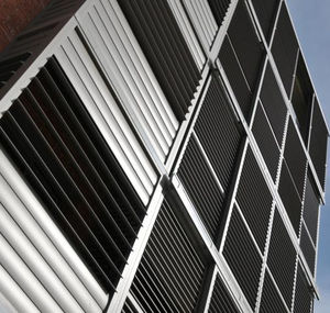 aluminum solar shading / for facade / vertical / orientable