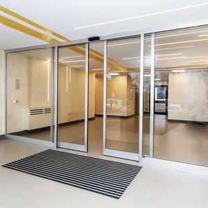 indoor door / sliding / aluminum / tempered glass