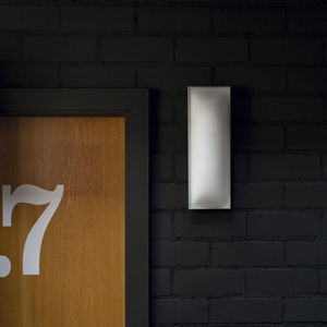 contemporary wall light / cast iron / glass / halogen