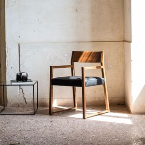 contemporary chair / upholstered / with armrests / sled base