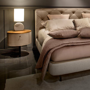 contemporary bedside table / ash / leather / metal base