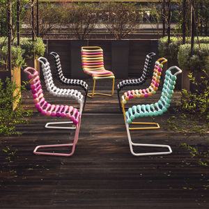 contemporary chair / stackable / cantilever / ergonomic