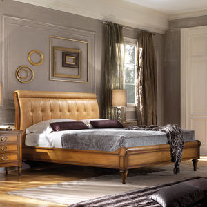 double bed / traditional / with upholstered headboard / wooden