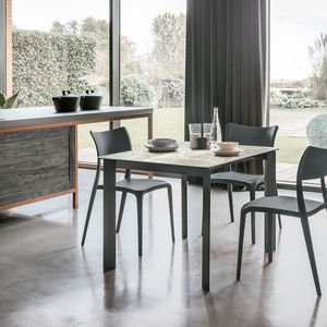 contemporary dining table / lacquered MDF / tempered glass / porcelain stoneware