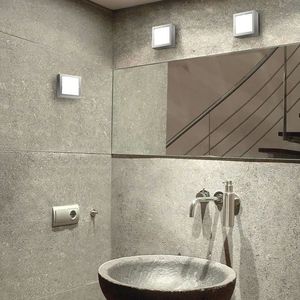 contemporary wall light / bathroom / aluminum / glass