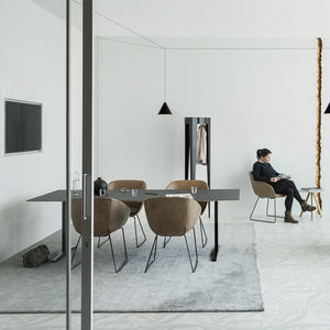 contemporary visitor armchair / leather / sled base / brown