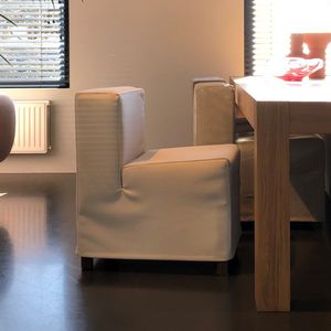 contemporary chair / upholstered / fabric / leather