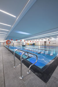 in-ground swimming pool / concrete / commercial / indoor