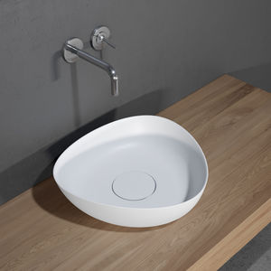 countertop washbasin / triangular / ceramic / contemporary