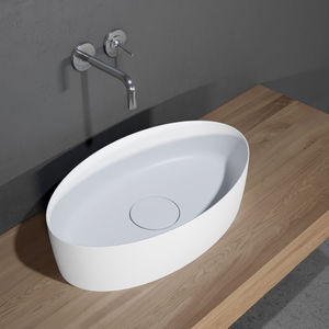 countertop washbasin / oval / ceramic / contemporary