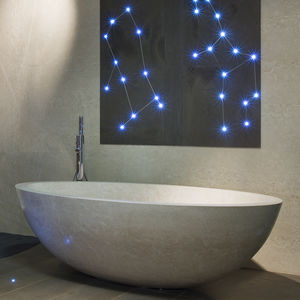 free-standing bathtub / oval / marble / natural stone