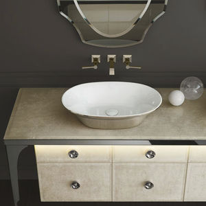 countertop washbasin / oval / ceramic / marble