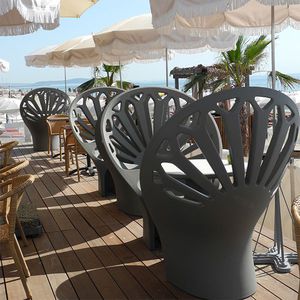 original design armchair / polymer / garden