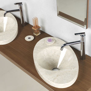 countertop washbasin / oval / natural stone / original design