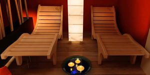 contemporary chaise longue / wooden / for wellness center