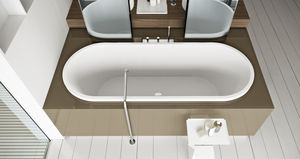 oval bathtub / Corian® / resin / marble