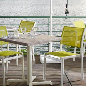 contemporary restaurant chair / with armrests / stackable / Batyline®