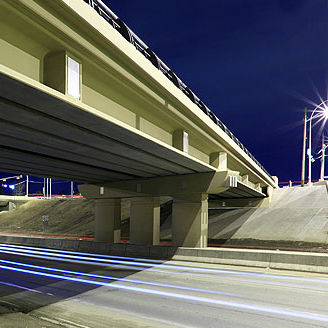 Precast concrete girder - Armtec - I / with symmetrical section / for bridge construction