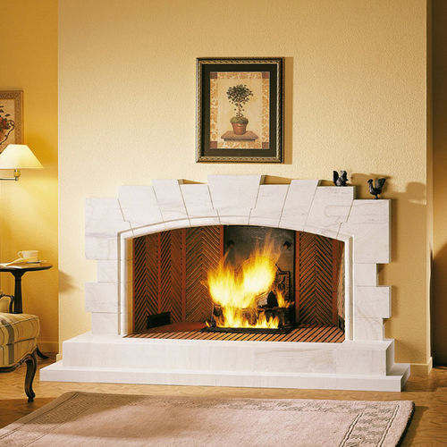 Traditional fireplace surround - MONTBROUAGE - Richard le Droff - stone