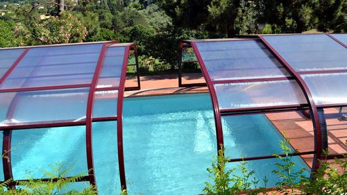 High swimming pool enclosure - IBIZA - abrisol - telescopic / metal / polycarbonate