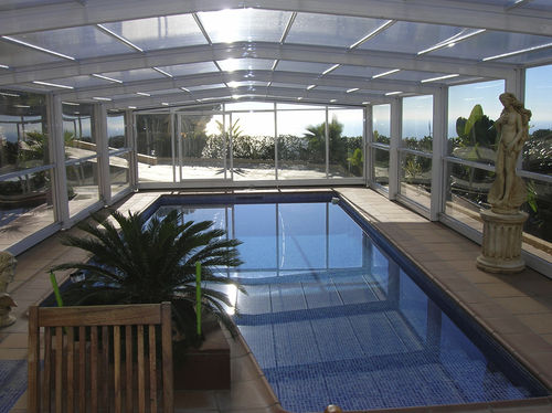 High swimming pool enclosure - CAPRI - abrisol - telescopic / metal / polycarbonate