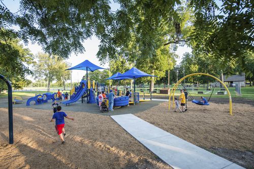 Playground structure - Riverside Kiwanis Park - Design 7763 - LANDSCAPE STRUCTURES - stainless steel / powder-coated steel / polyethylene