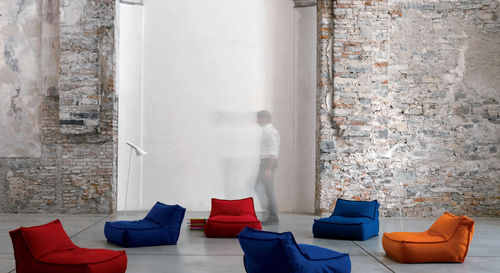 Contemporary fireside chair - ZOE - Verzelloni - leather / by Studio Lievore Altherr Molina