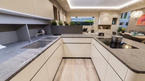 Stone countertop - BROWN SILK - Nikolaus Bagnara S.p.A. - for kitchen / gray / high-gloss