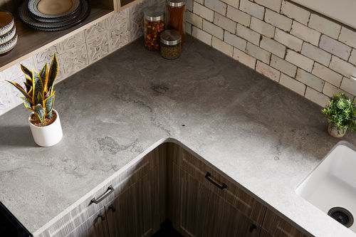 Limestone countertop - PORTLAND TAUPE - Nikolaus Bagnara S.p.A. - for kitchen / exterior / gray
