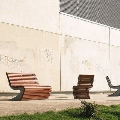 Contemporary public bench - ACROBÁNTICO - Colomer - wooden / cast aluminum / with backrest