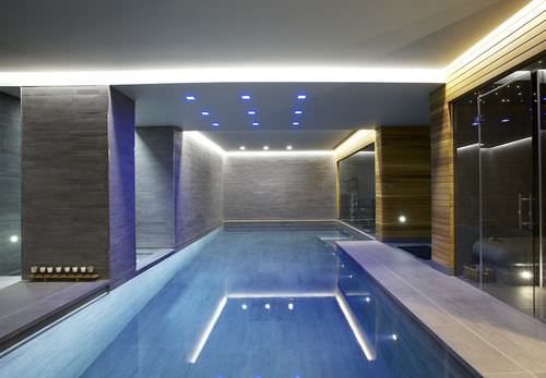 Indoor swimming pool - GUNCAST SWIMMING POOLS - in-ground / concrete