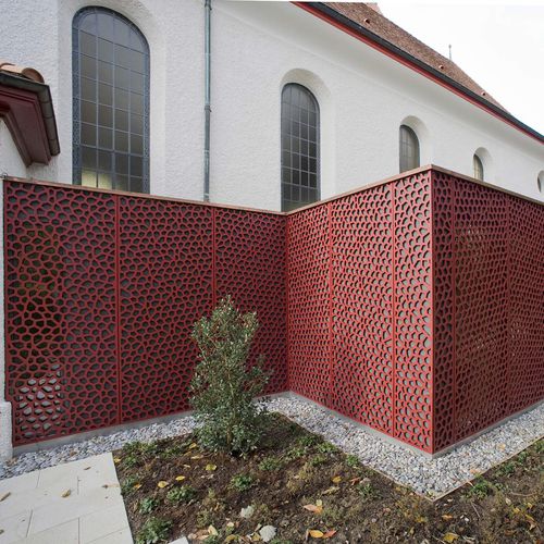 Exterior fitting decorative panel - FORMBOARD TOP PINE - CHURCH ARLESHEIM - Bruag Design Factory AG - in wood fiber / perforated / screening