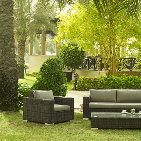 Contemporary armchair - GABRIEL - Rattan House - rattan / garden