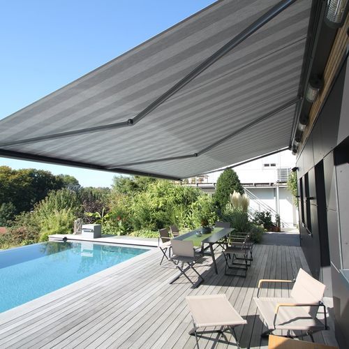 Folding-arm awning - 230 - Kadeco Sonnenschutzsysteme GmbH - motorized / commercial / patio