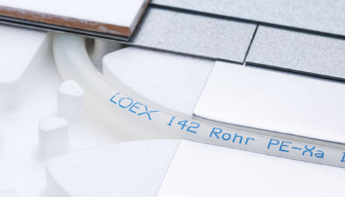Hot water underfloor heating - HOME PLAIN - LOEX - residential / with expanded polystyrene panel