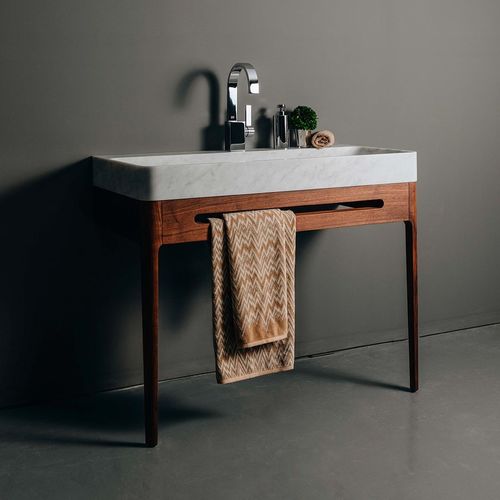 Console washbasin - FIJI - MAAMI HOME - marble / with counter / with towel rack