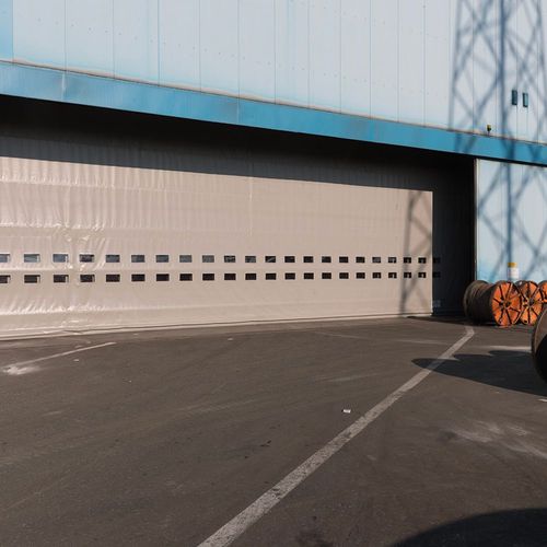 Fold-up industrial door - SAILDOOR® - Apostoli Daniele - galvanised steel / PVC / wind-proof