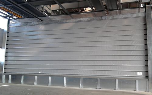 Roll-up industrial door - REVERSO - Apostoli Daniele - fold-up / galvanised steel / PVC