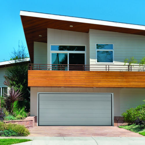 Overlap garage door - WIDE - Delta Overlap - polyurethane foam / sheet steel / automatic