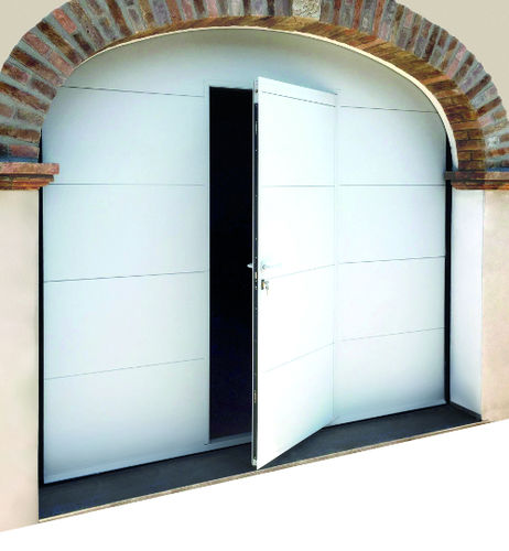 Tilting garage door - OVERBAS  - Delta Overlap - retractable / polyurethane foam / sheet steel