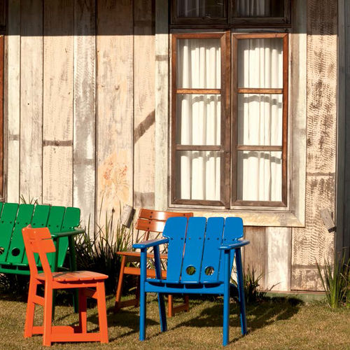 Contemporary armchair - TAJÁ - Butzke - wooden / brown / blue